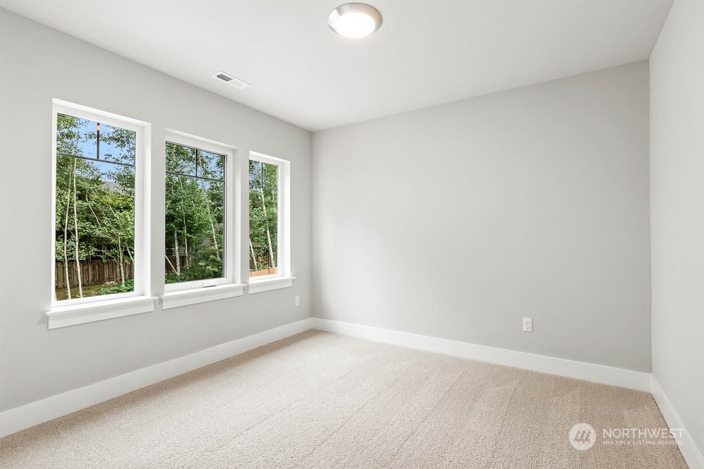 21423 Royal Anne Road, Unit RM1 Bothell, WA 98021 - Photo 11 of 26 an empty room with a window