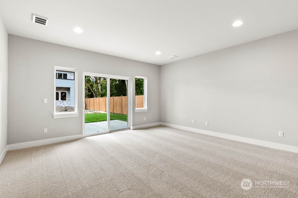 21423 Royal Anne Road, Unit RM1 Bothell, WA 98021 - Photo 14 of 26 a view of an empty room with a window