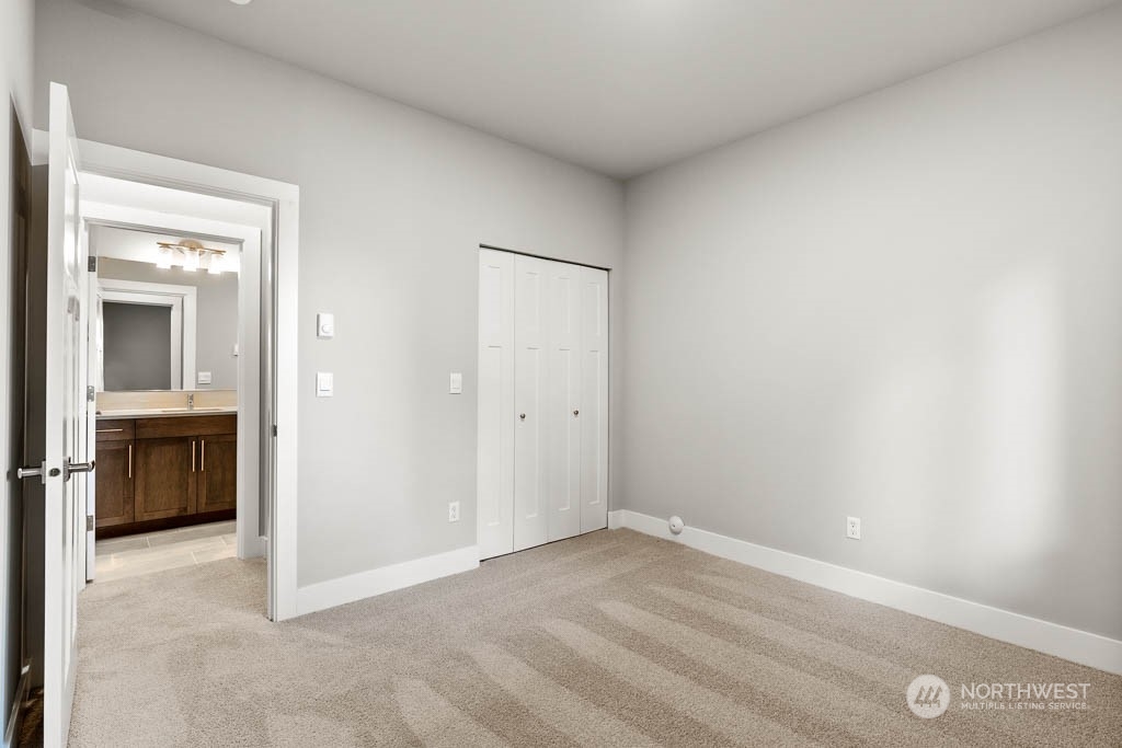 21423 Royal Anne Road, Unit RM1 Bothell, WA 98021 - Photo 17 of 26 an empty room with a bathroom