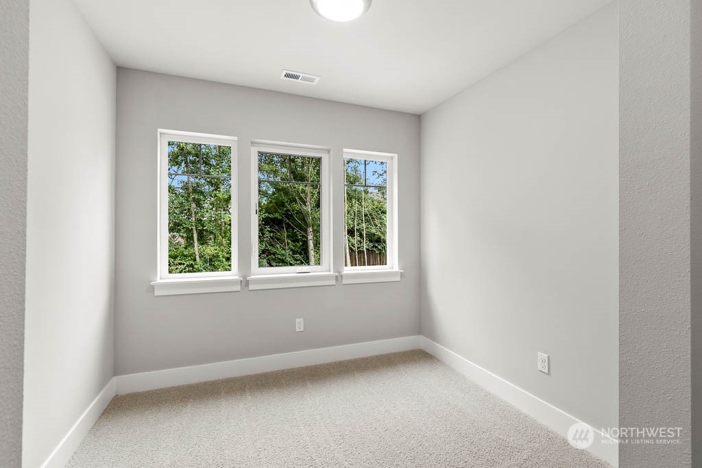 21423 Royal Anne Road, Unit RM1 Bothell, WA 98021 - Photo 5 of 26 an empty room with a window