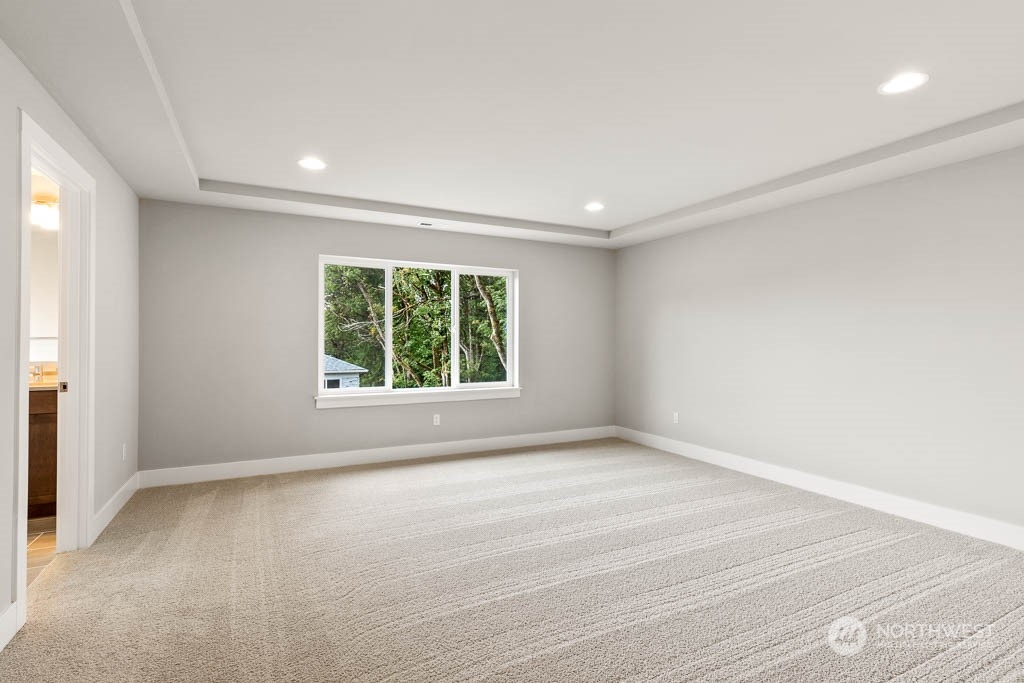 21423 Royal Anne Road, Unit RM1 Bothell, WA 98021 - Photo 6 of 26 an empty room with windows