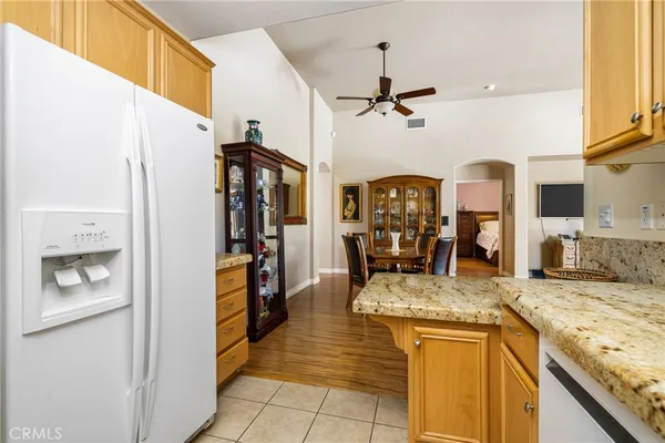 a view of living room with granite countertop furniture and fireplace