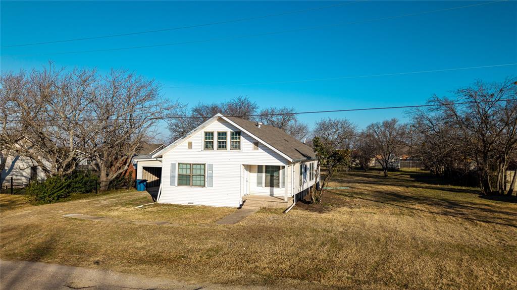 108 Stroud Street Frost, TX 76641 - Photo 9 of 36 a view of a house with a yard