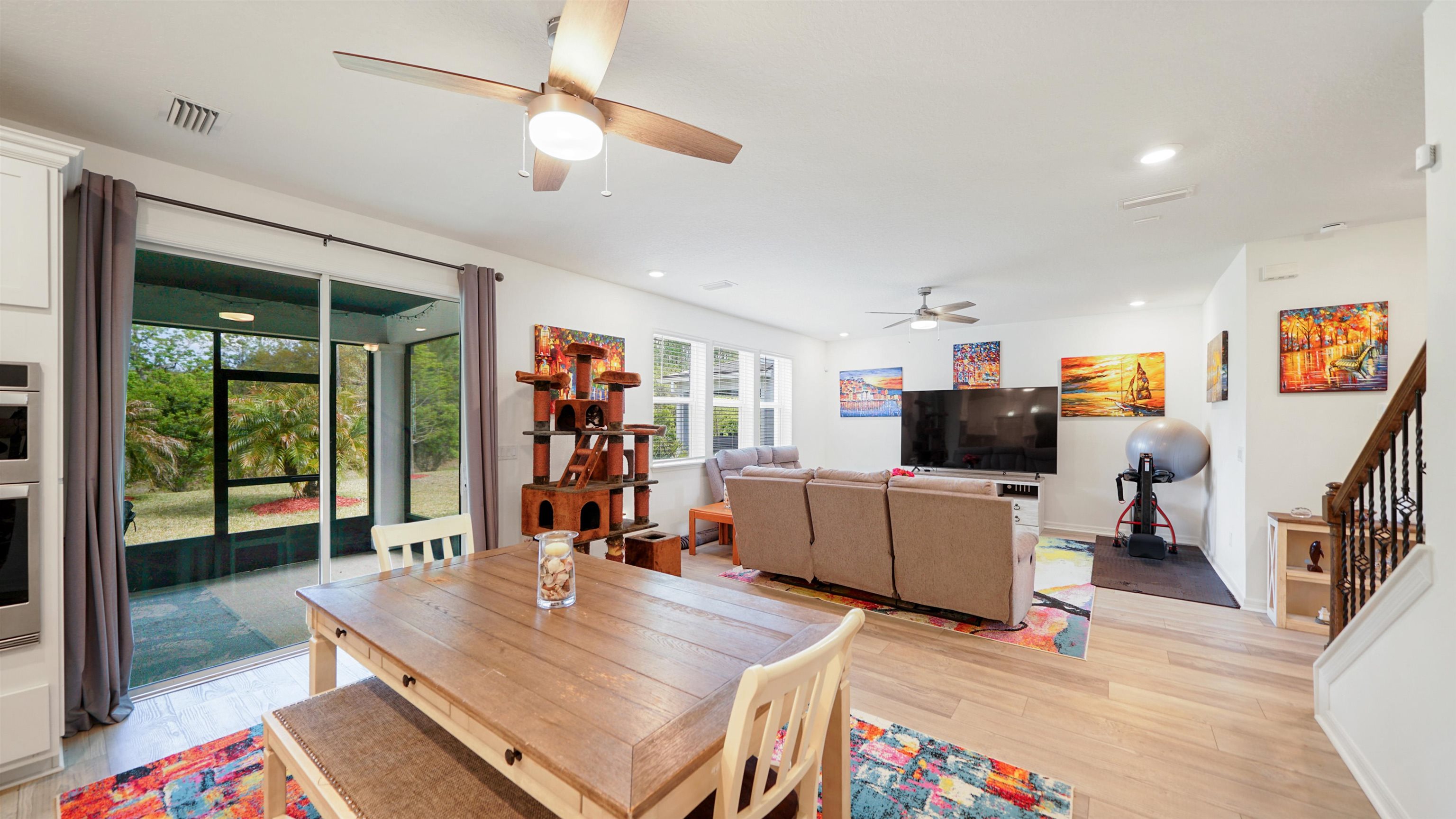 314 Red Barn Road St. Augustine, FL 32092 - Photo 12 of 45 a living room with furniture and a flat screen tv