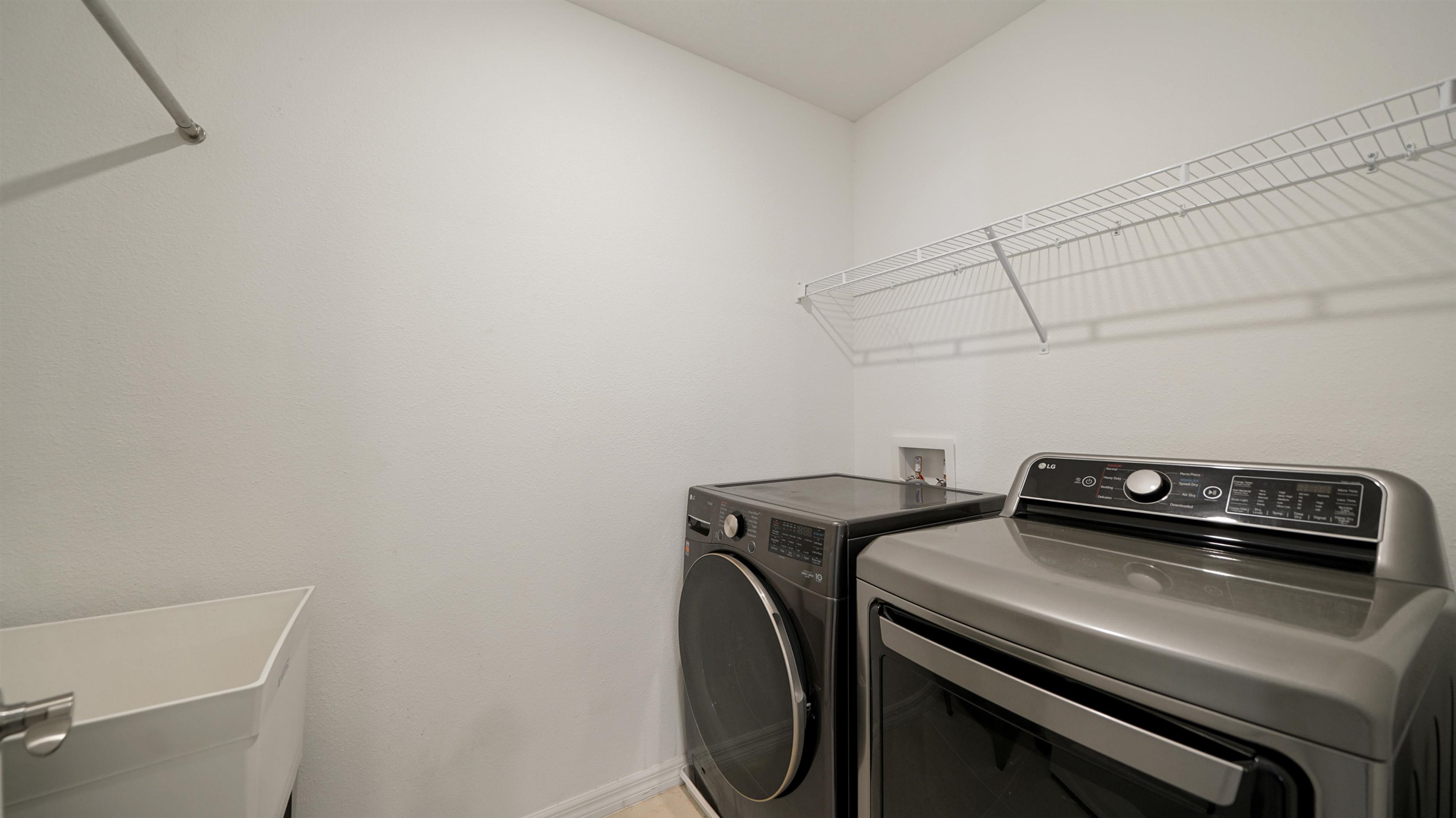 314 Red Barn Road St. Augustine, FL 32092 - Photo 17 of 45 a utility room with dryer and washer