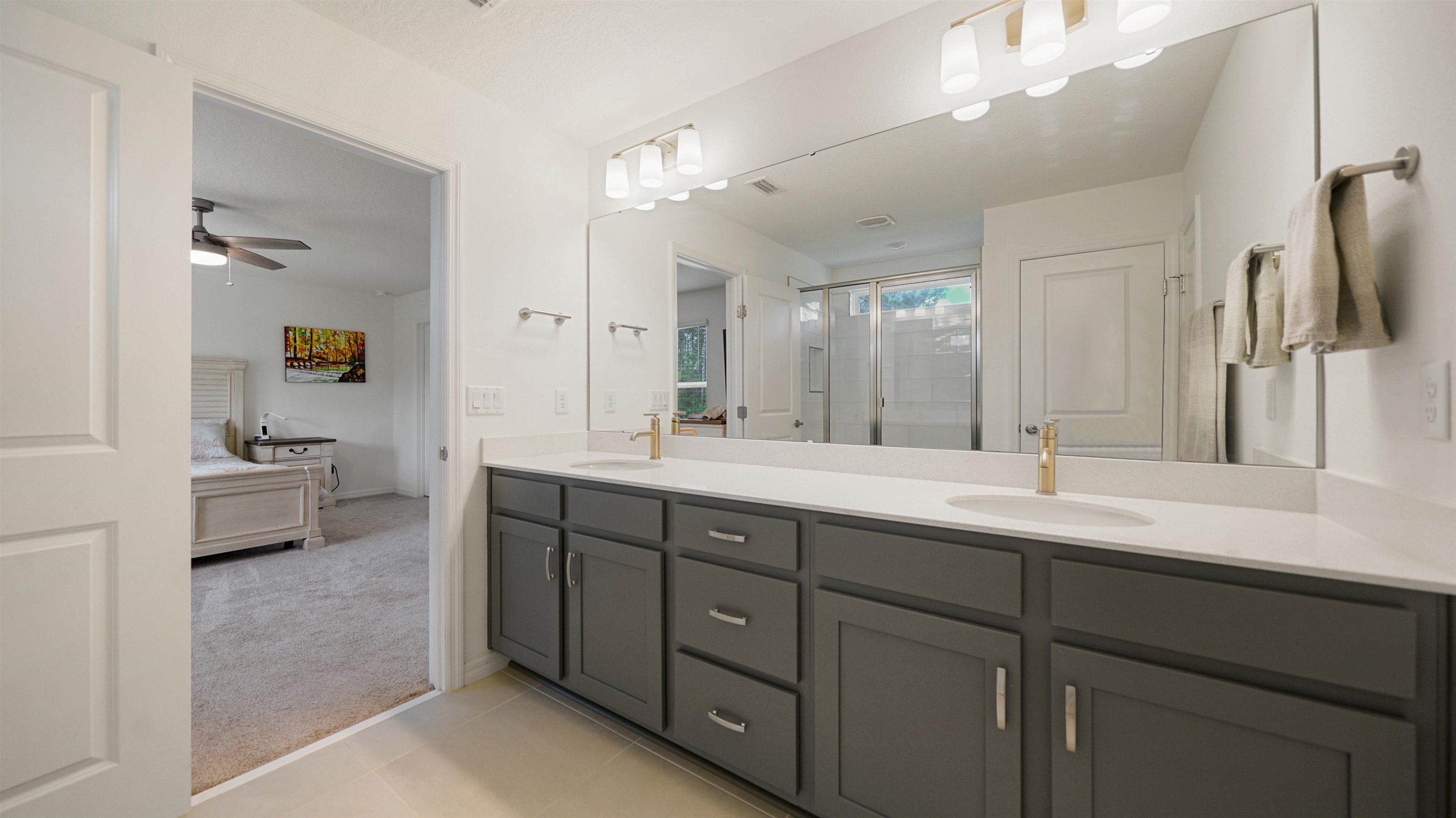 314 Red Barn Road St. Augustine, FL 32092 - Photo 23 of 45 a spacious bathroom with a double vanity sink double and mirror
