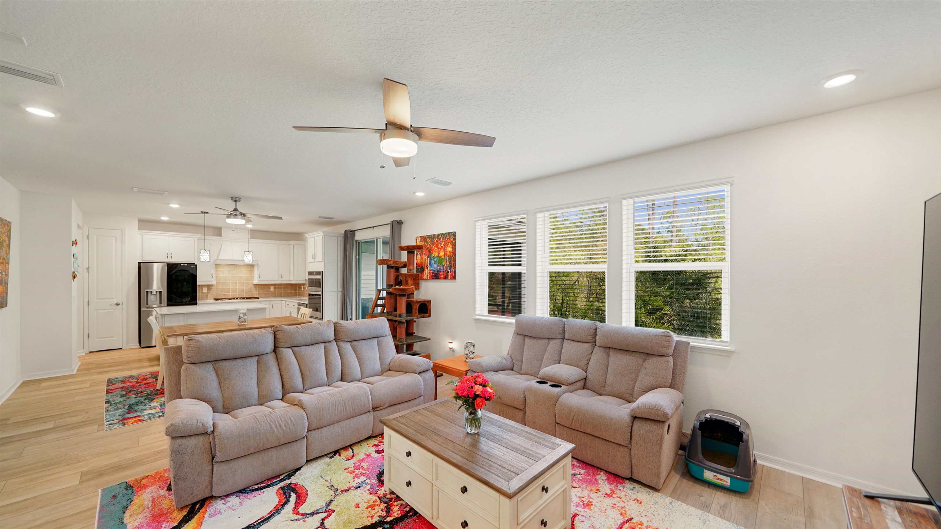 314 Red Barn Road St. Augustine, FL 32092 - Photo 3 of 45 a living room with furniture a flat screen tv and a window