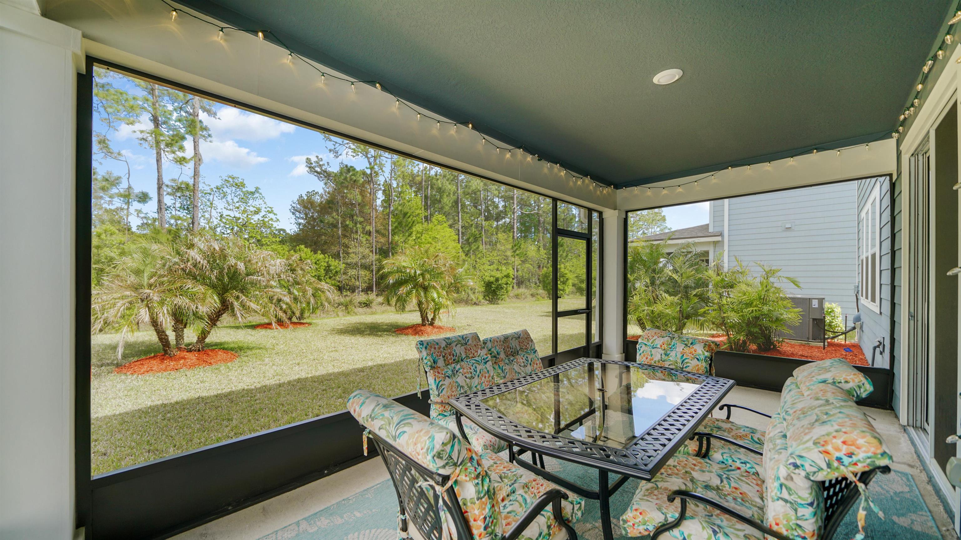 314 Red Barn Road St. Augustine, FL 32092 - Photo 31 of 45 a dining room with furniture and garden view