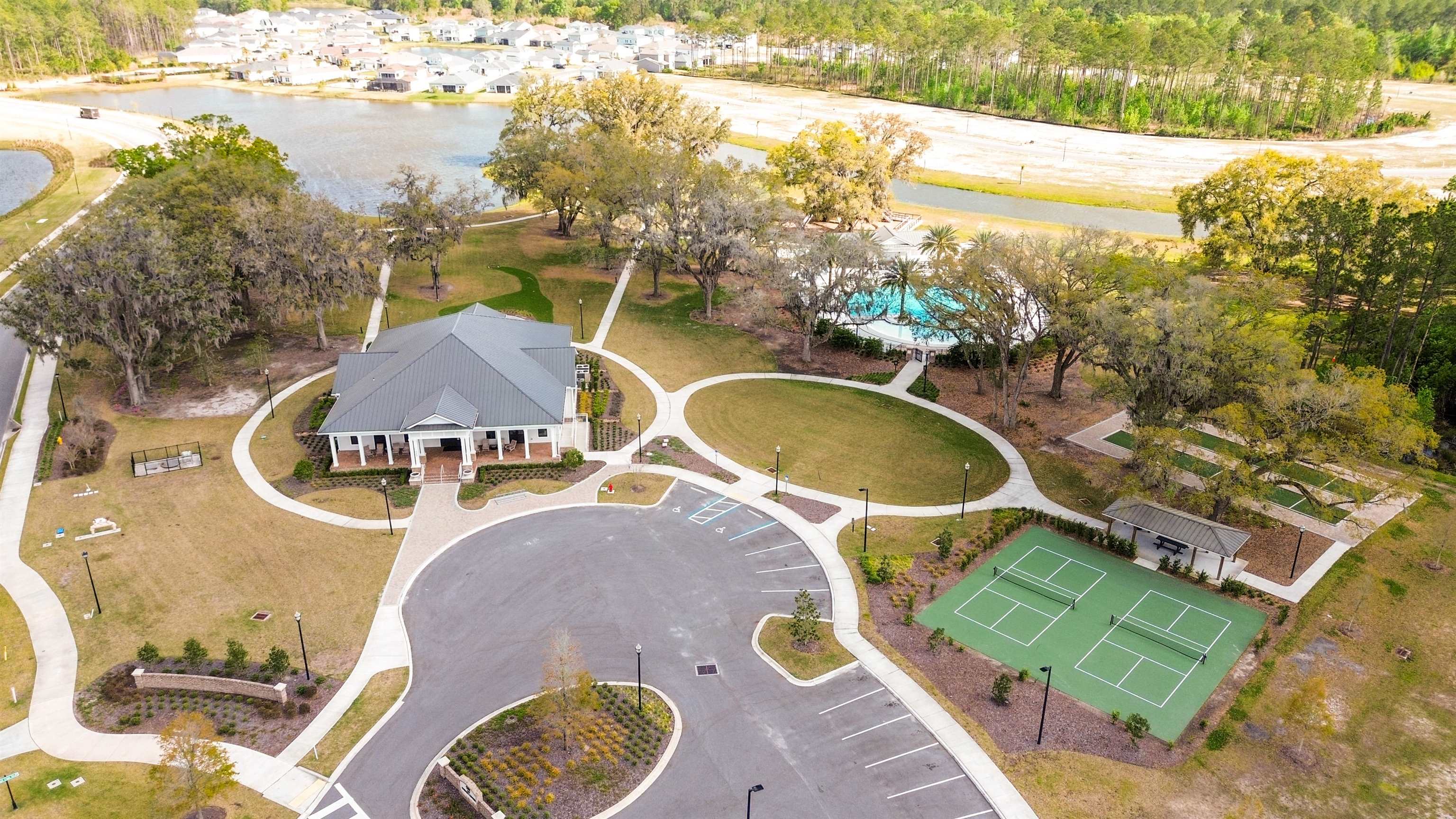 314 Red Barn Road St. Augustine, FL 32092 - Photo 38 of 45 a view of a swimming pool with a patio