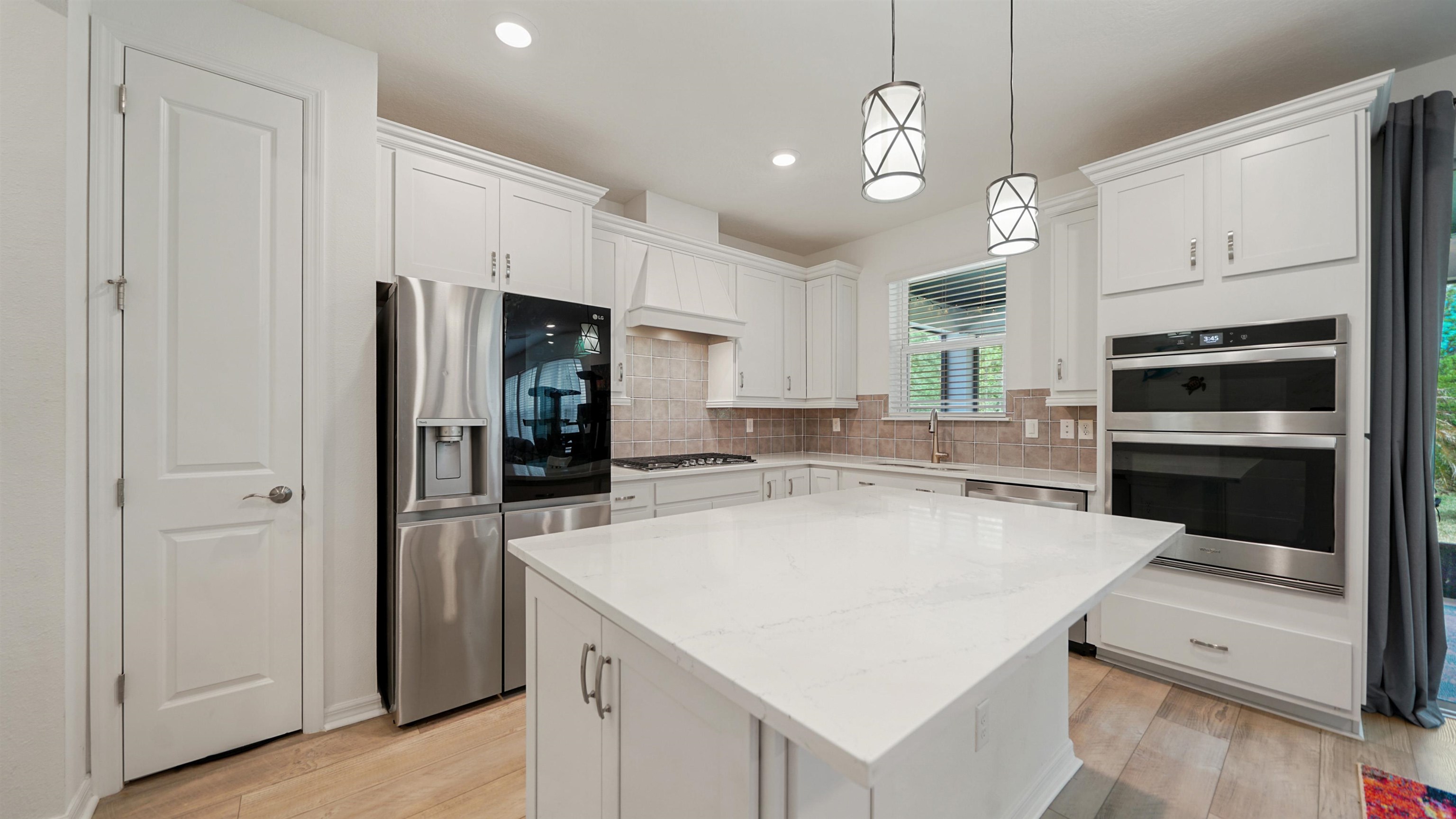 314 Red Barn Road St. Augustine, FL 32092 - Photo 4 of 45 a kitchen with a sink a stove and refrigerator