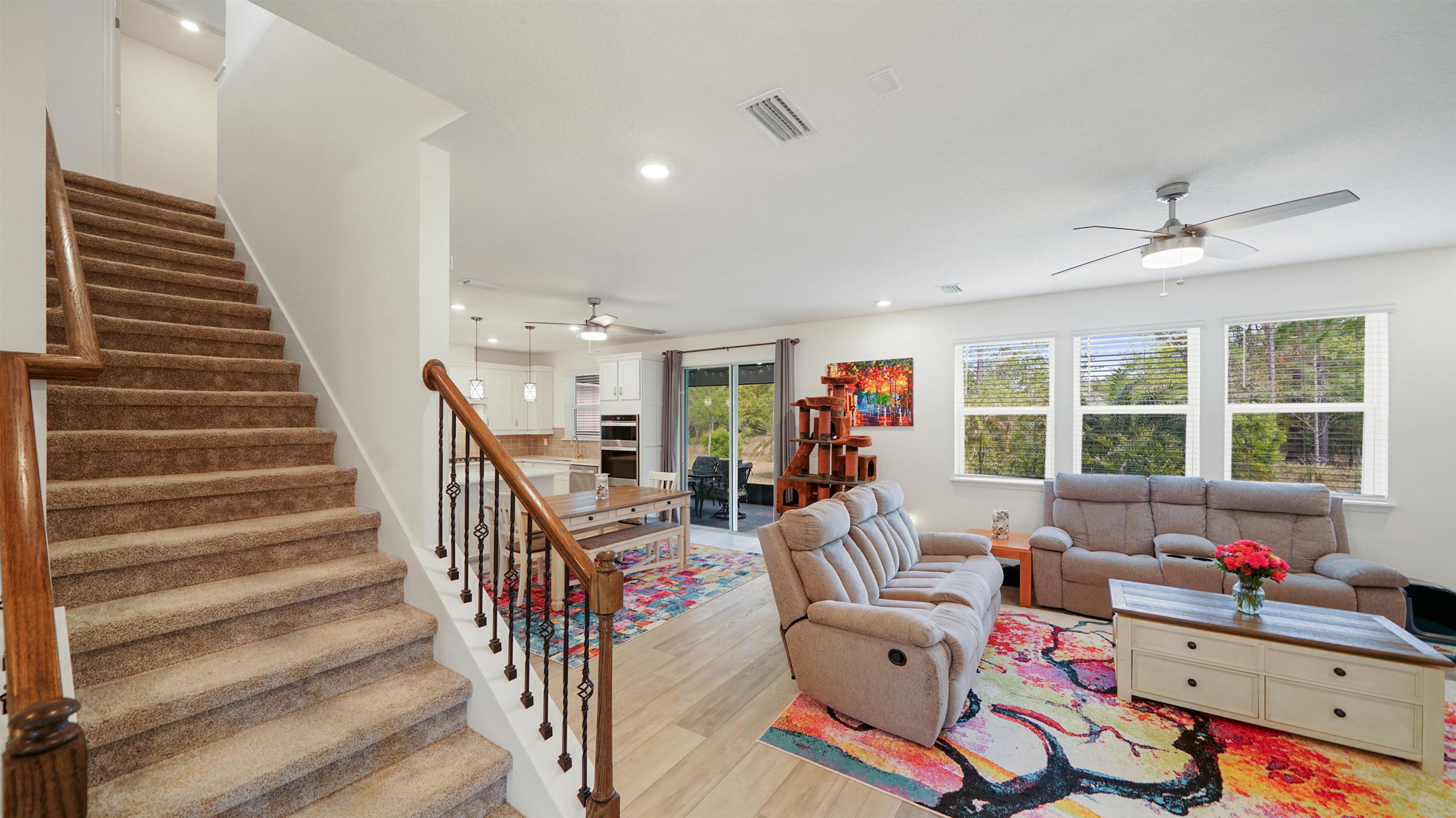 314 Red Barn Road St. Augustine, FL 32092 - Photo 8 of 45 a living room with furniture and stairs