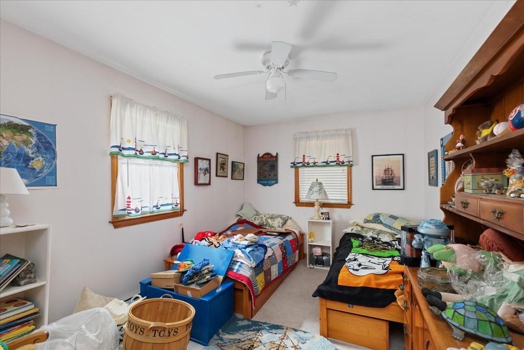 68 Jowders Cove Road Rindge, NH 03461 - Photo 18 of 22 a room with furniture toys and a flat screen tv