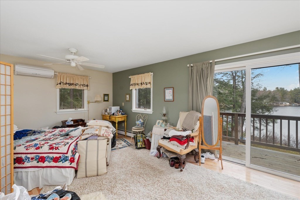 68 Jowders Cove Road Rindge, NH 03461 - Photo 20 of 22 a living room with furniture and a window