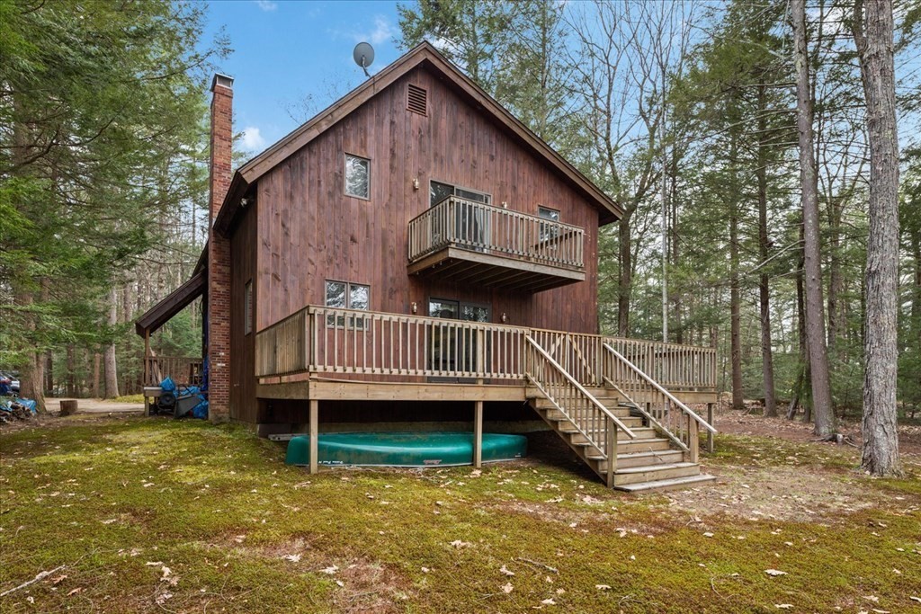 68 Jowders Cove Road Rindge, NH 03461 - Photo 3 of 22 a view of a house with a yard
