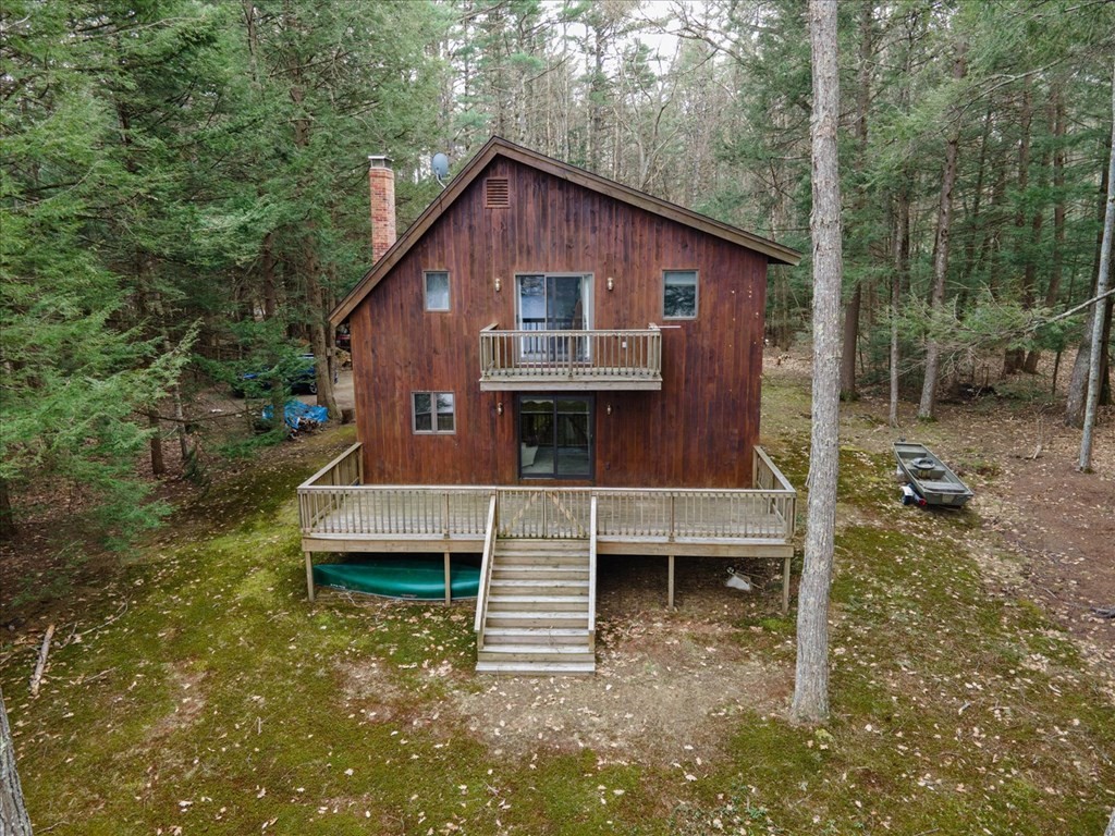 68 Jowders Cove Road Rindge, NH 03461 - Photo 4 of 22 a view of a house with a yard