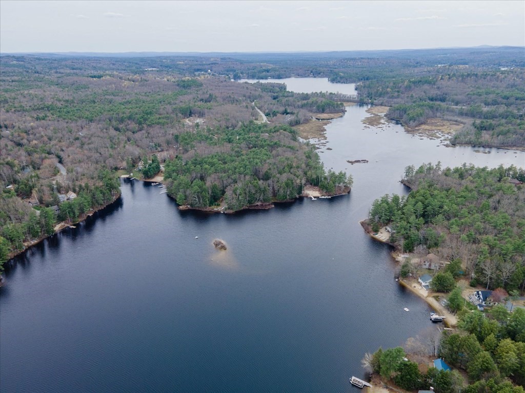 68 Jowders Cove Road Rindge, NH 03461 - Photo 6 of 22 an aerial view of ocean with residential house and outdoor space