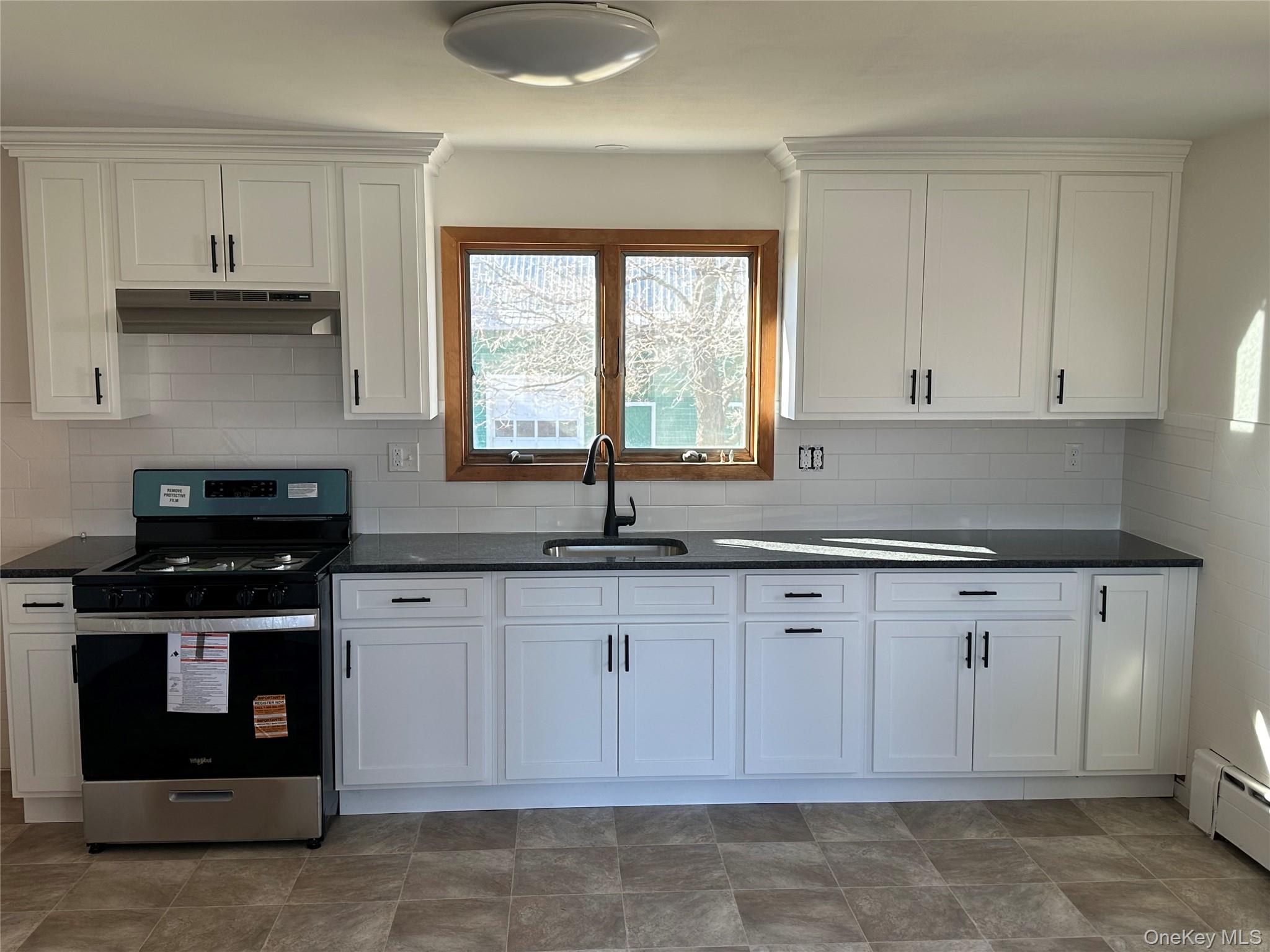 3 Indiana Road Goshen, NY 10924 - Photo 4 of 13 Newly renovated Kitchen with updated cabinets and stove.