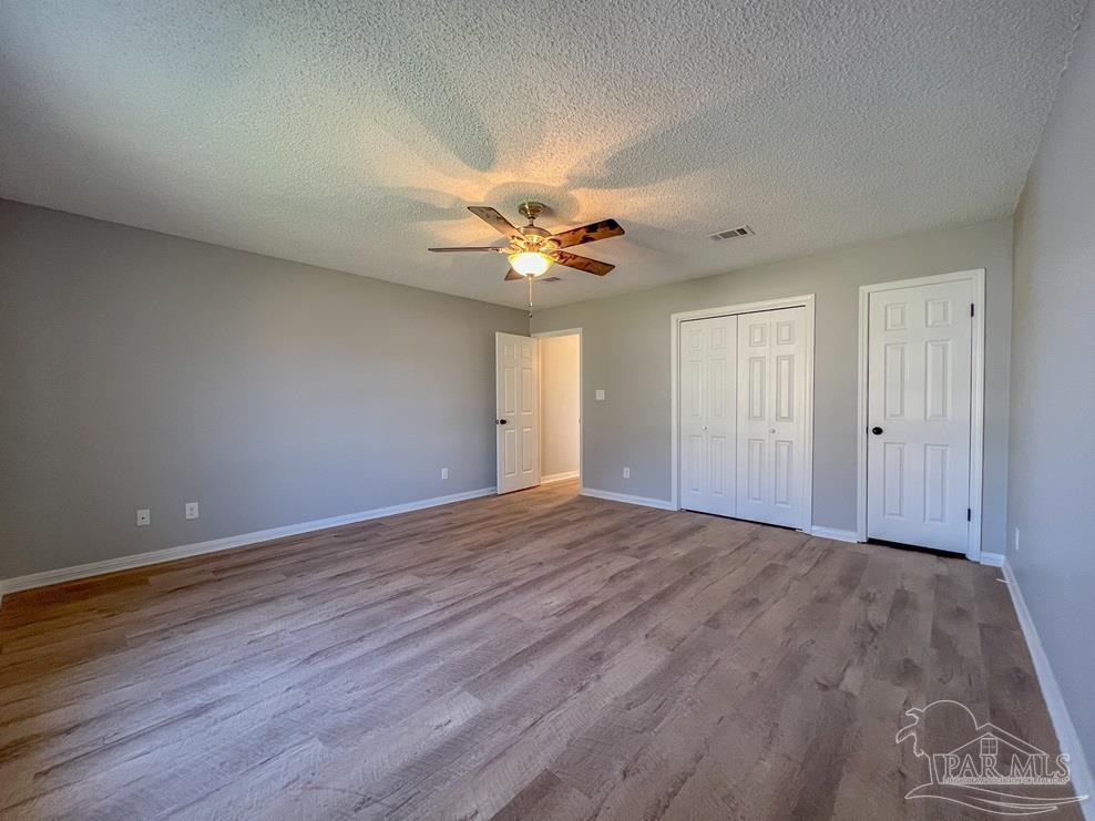 4285 Dana Street Pace, FL 32571 - Photo 25 of 26 a view of an empty room with a window