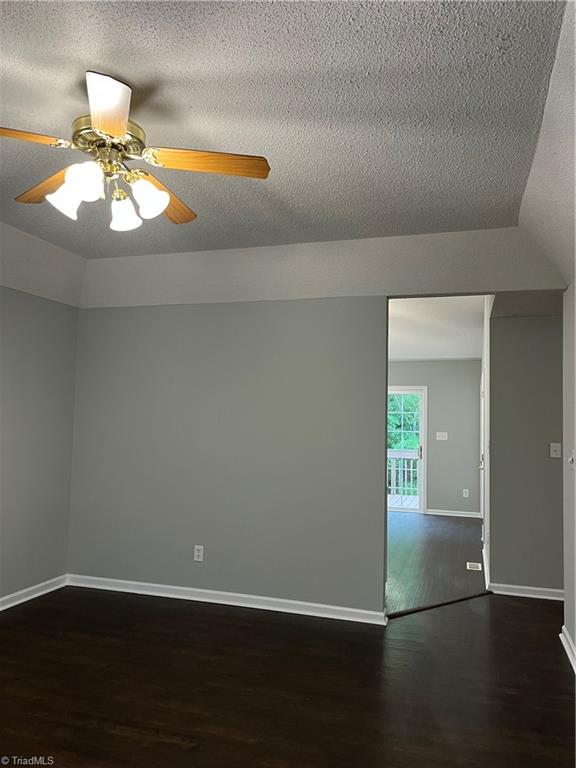 4740 Beckel Road Winston-Salem, NC 27127 - Photo 8 of 33 Notice the Den Ceiling Height