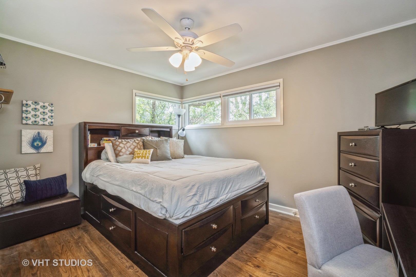 911 Dell Road Northbrook, IL 60062 - Photo 14 of 17 a bedroom with a bed and a chandelier