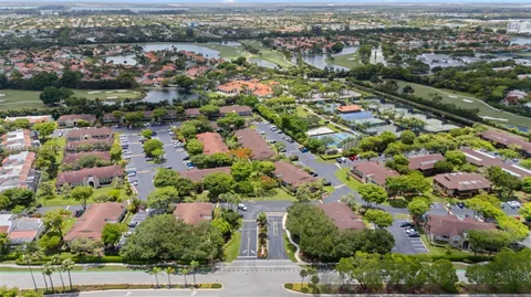 an aerial view of house with yard