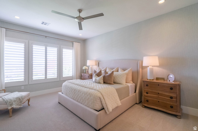 3166 South Tallow Tree Drive St. George, UT 84790 - Photo 15 of 32 Bedroom featuring three large windows with plantation shutters, recessed lighting, and a ceiling fan