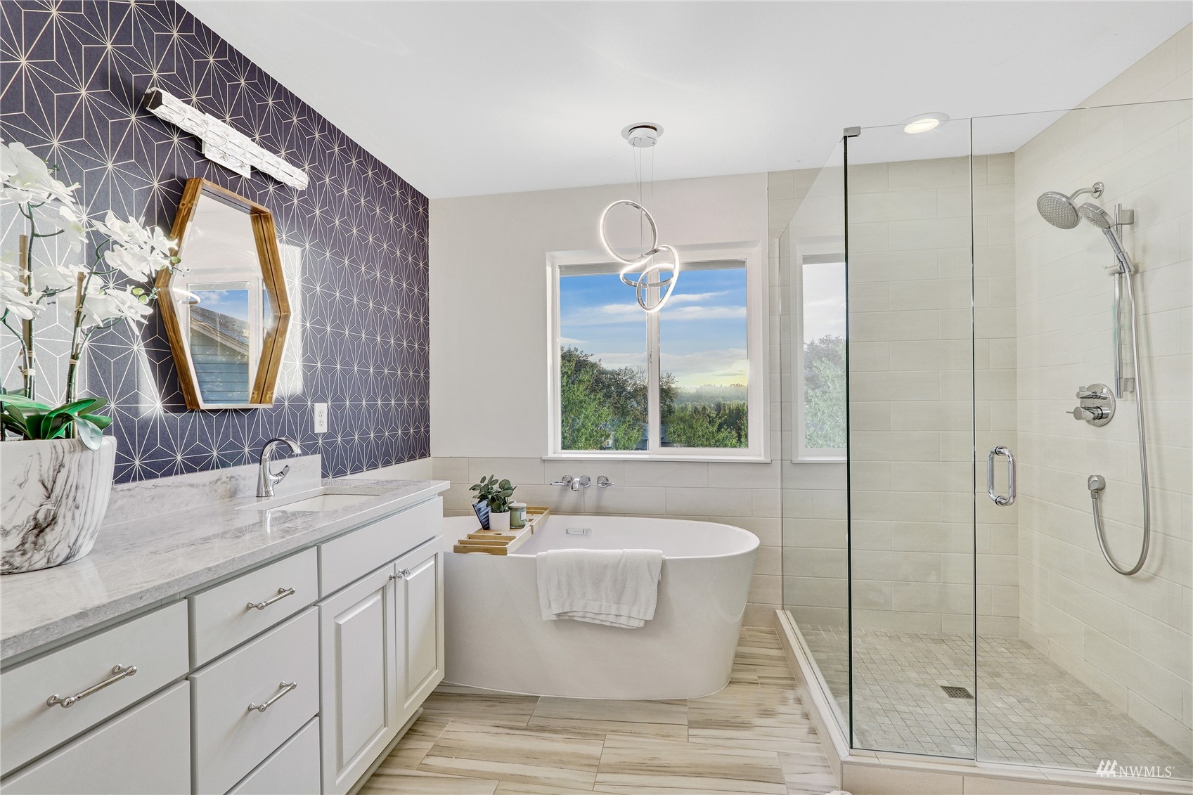 8539 Northeast 202nd Way Bothell, WA 98011 - Photo 21 of 31 a bathroom with a double vanity sink mirror and bathtub