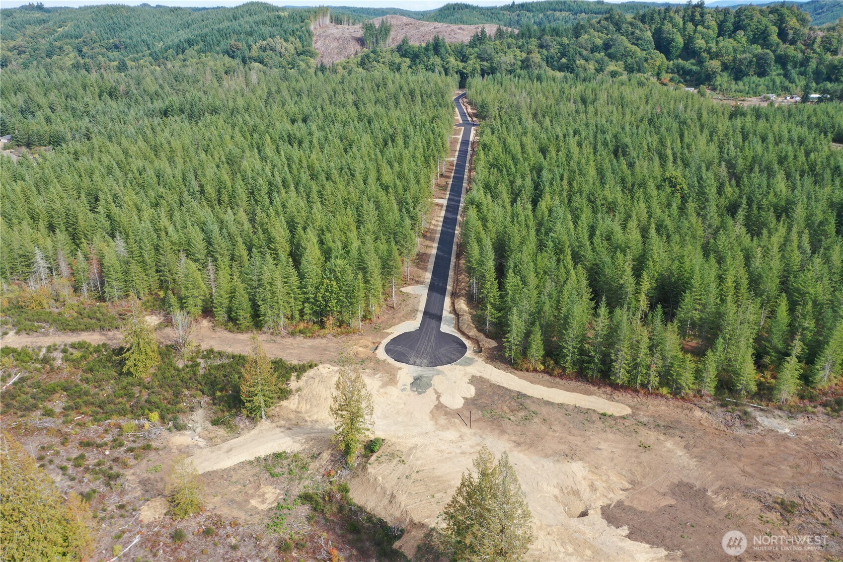 0 Lot 4 Div Elma, WA 98541 - Photo 11 of 11 a view of a garden with a wooden fence