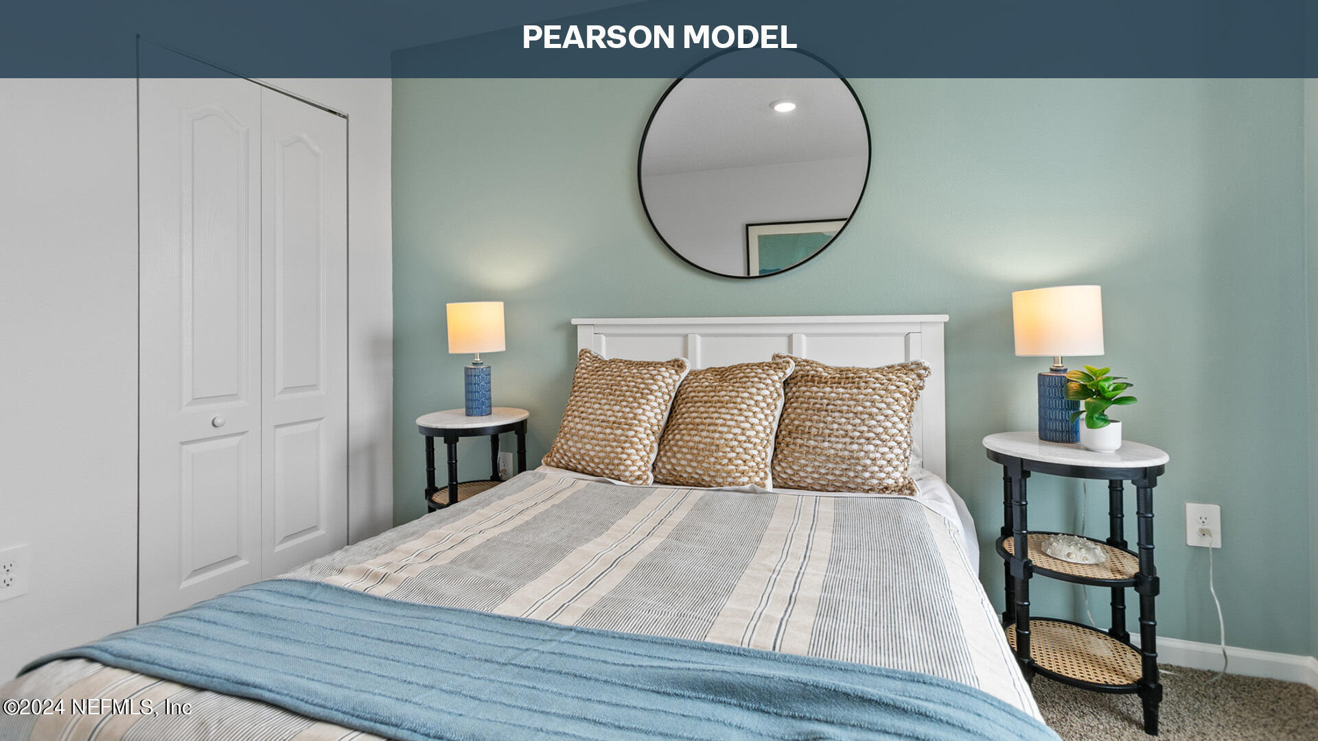 1484 Jeremiah Street Middleburg, FL 32068 - Photo 24 of 39 a bed room with a bed mirror and a potted plant