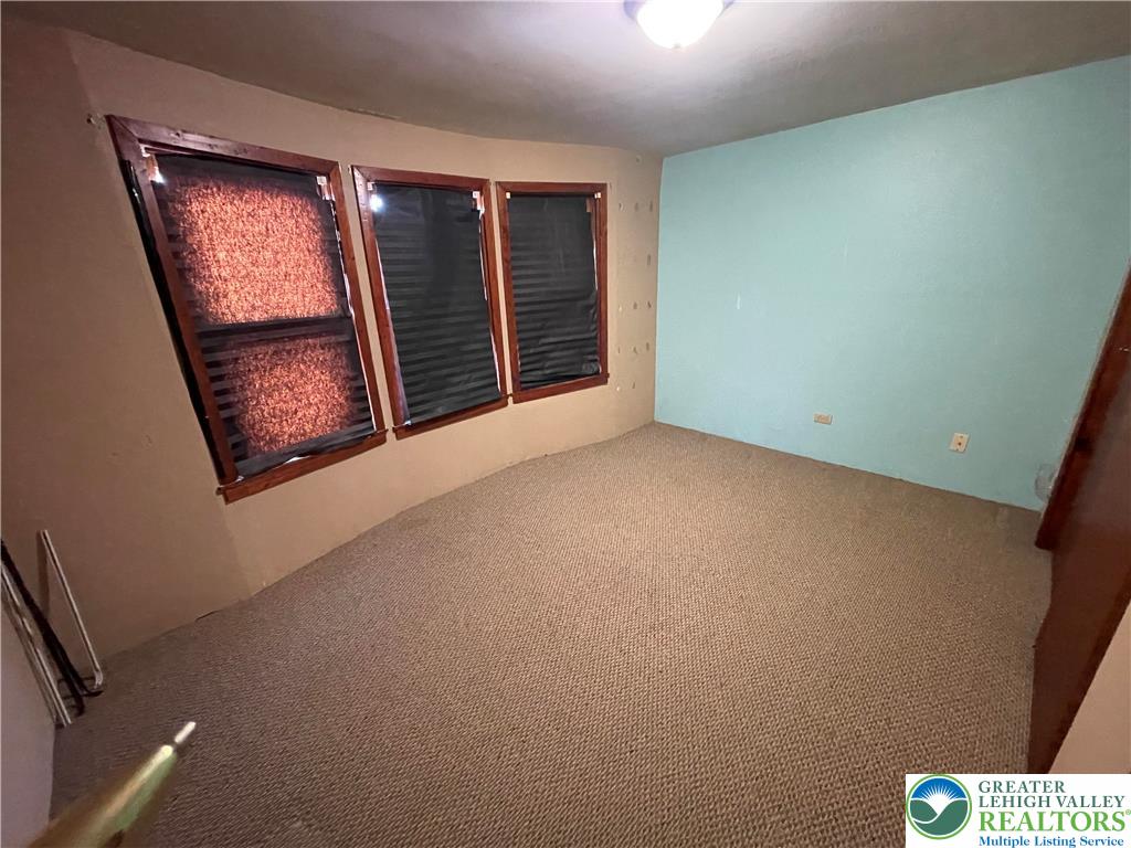 512 Forrest Avenue Bethlehem, PA 18017 - Photo 11 of 22 an empty room with a hallway