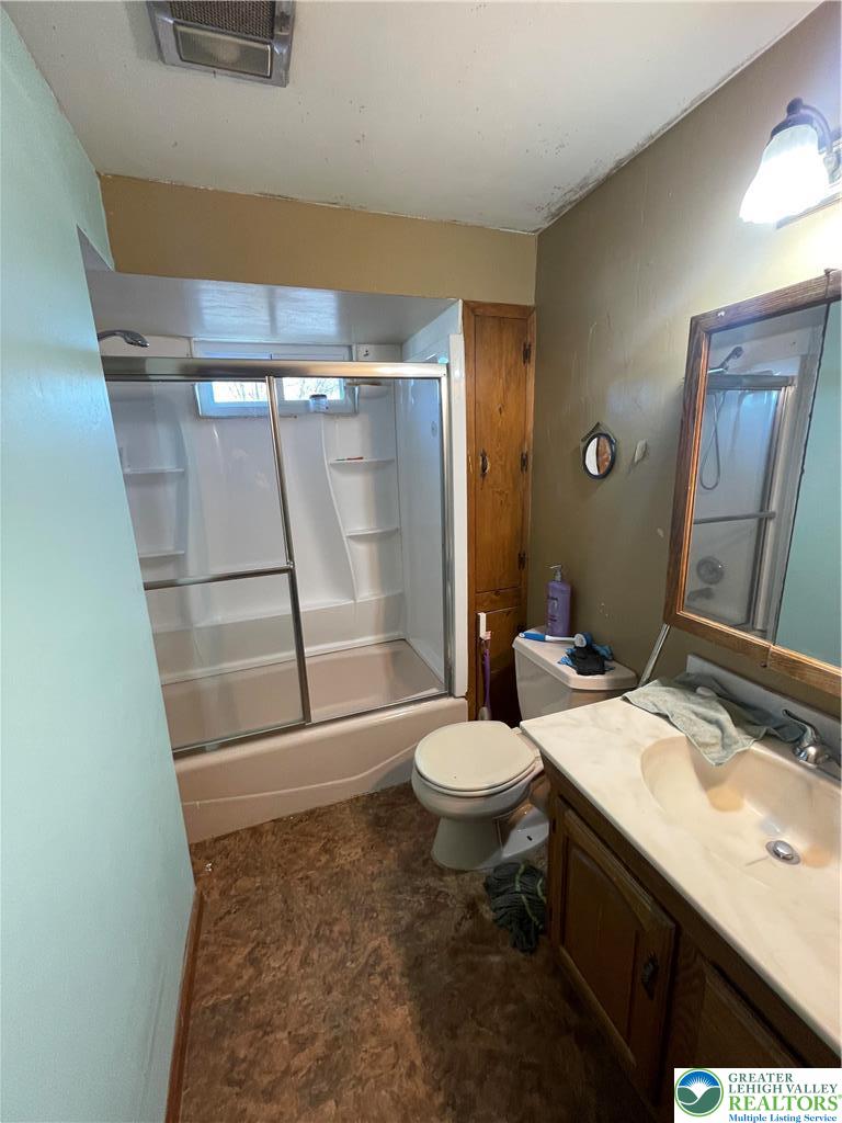 512 Forrest Avenue Bethlehem, PA 18017 - Photo 12 of 22 a bathroom with a sink a toilet and shower