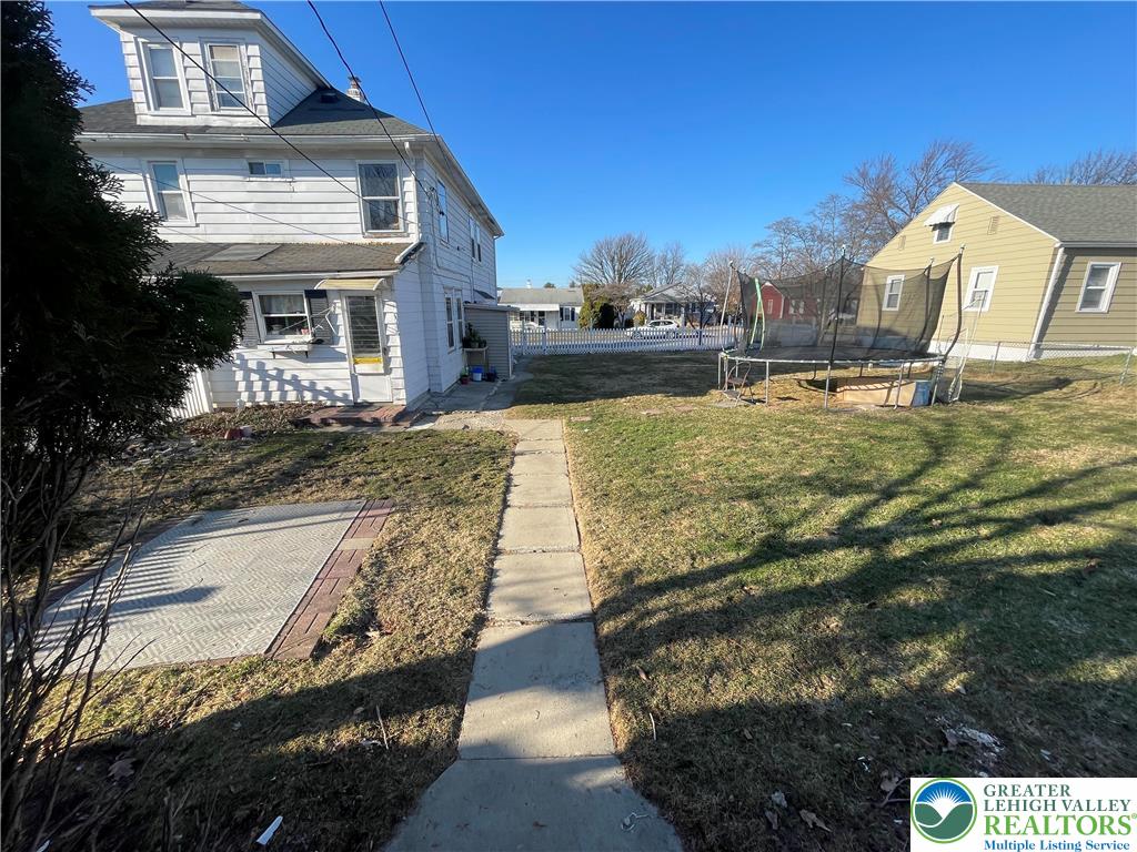 512 Forrest Avenue Bethlehem, PA 18017 - Photo 18 of 22 a front view of a house with a yard