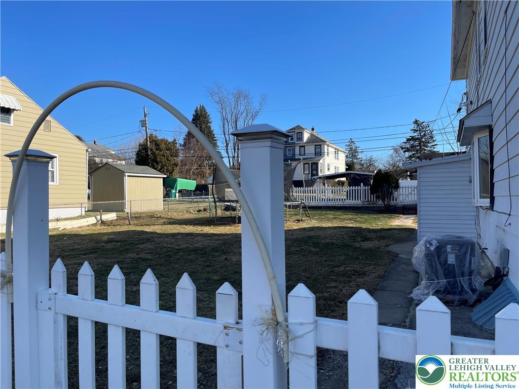 512 Forrest Avenue Bethlehem, PA 18017 - Photo 2 of 22 a view of a wooden house with a small yard