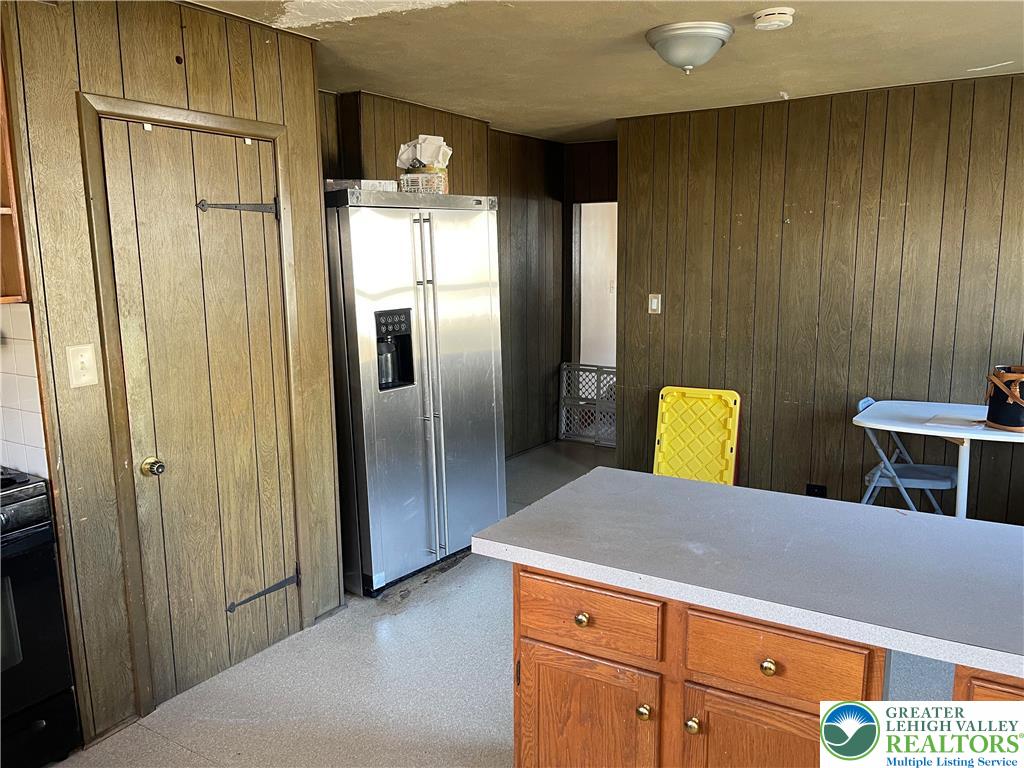 512 Forrest Avenue Bethlehem, PA 18017 - Photo 5 of 22 a kitchen with stainless steel appliances granite countertop a refrigerator and a sink