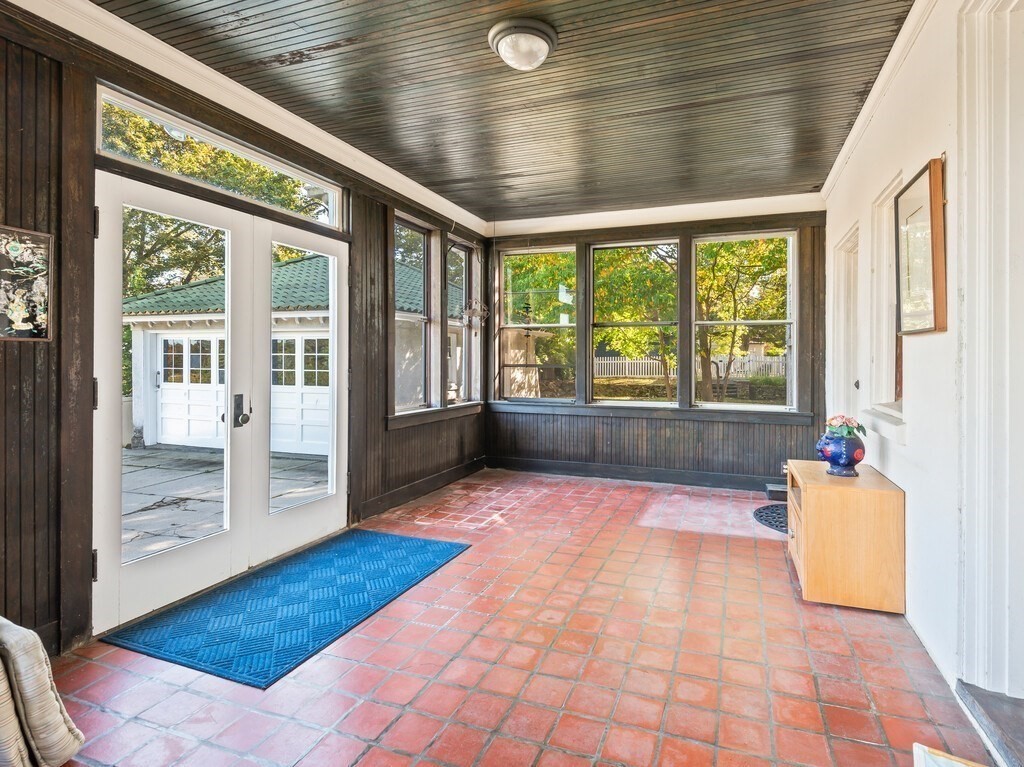 19 Kenilworth Road Worcester, MA 01602 - Photo 12 of 42 a view of an entryway with a floor to ceiling window and an outdoor space