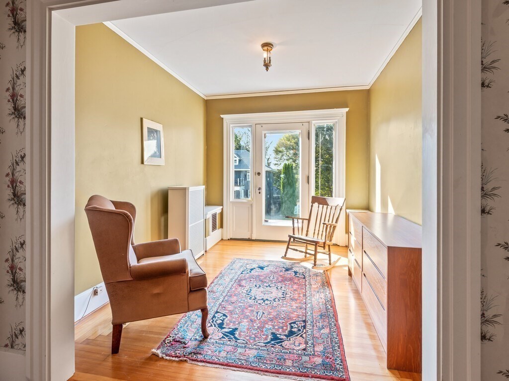 19 Kenilworth Road Worcester, MA 01602 - Photo 25 of 42 a living room with furniture and a floor to ceiling window