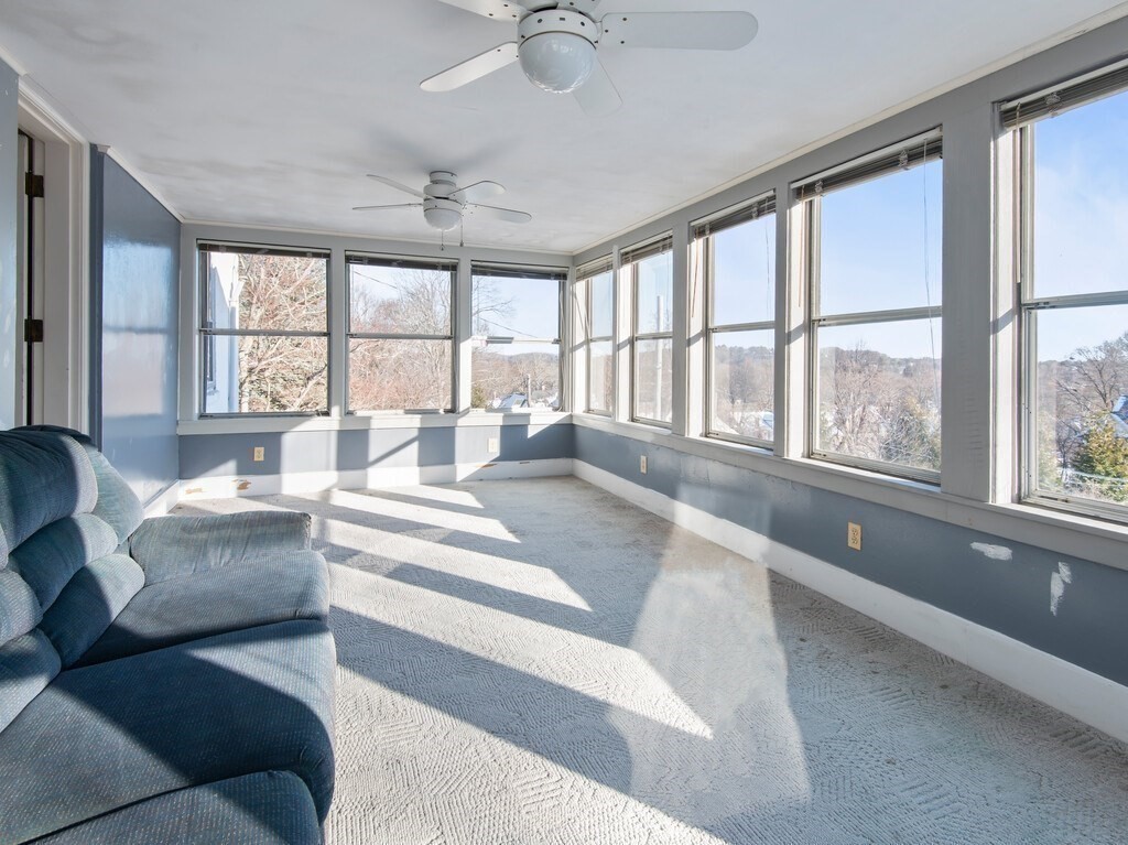 19 Kenilworth Road Worcester, MA 01602 - Photo 34 of 42 a living room with furniture and large windows