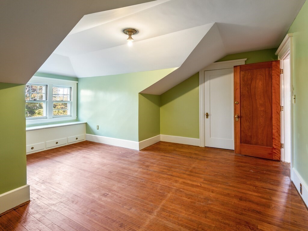 19 Kenilworth Road Worcester, MA 01602 - Photo 35 of 42 a view of empty room with wooden floor and fan