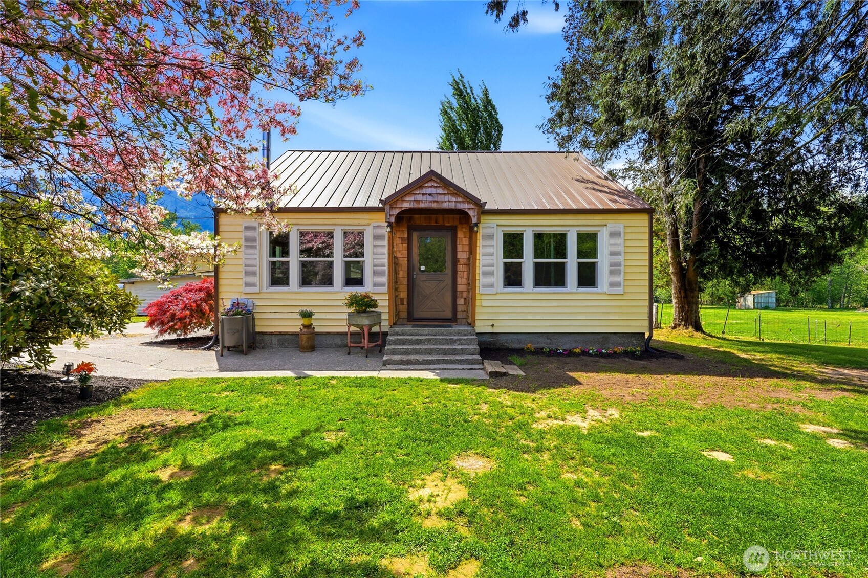 21716 State Rte 530 Northeast Arlington, WA 98223 - Photo 10 of 38 a view of a house with a yard porch and sitting area