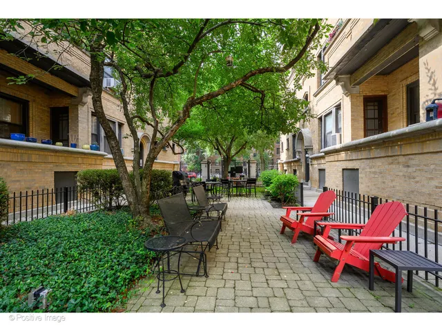 a backyard of a house with seating space