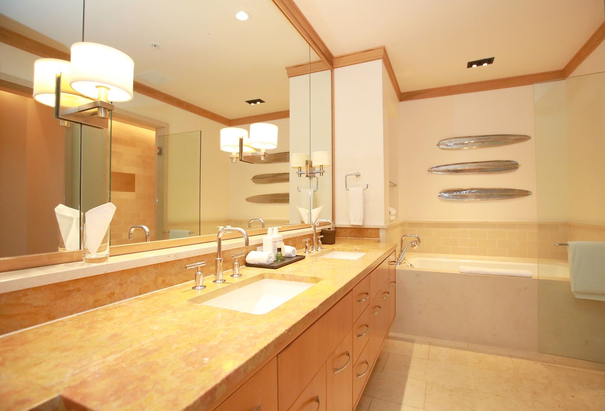 1 Bay Drive, Unit 2202 Lahaina, HI 96761 - Photo 32 of 50 a bathroom with a granite countertop sink and a bathtub