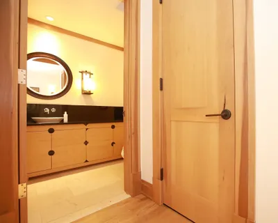 a bathroom with a mirror and a shower