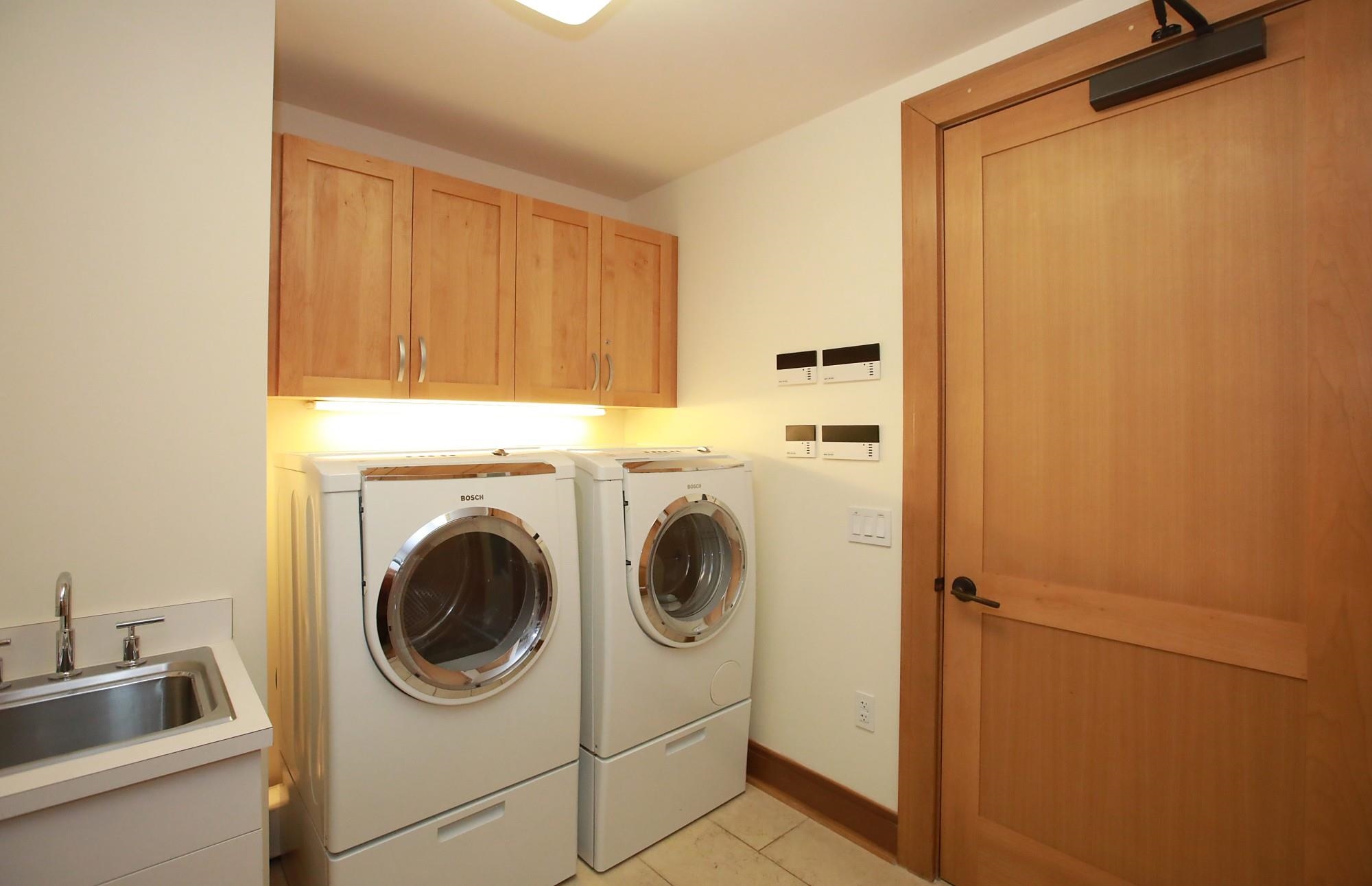 1 Bay Drive, Unit 2202 Lahaina, HI 96761 - Photo 42 of 50 a utility room with dryer and washer