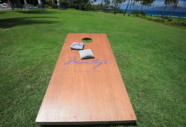 a view of a garden with a building in the background