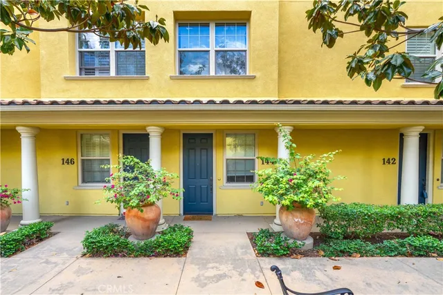 a front view of a house having yard
