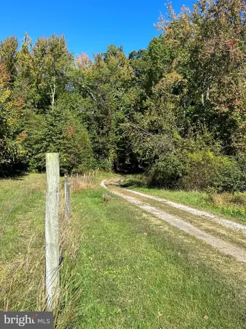 a view of a yard with an outdoor space