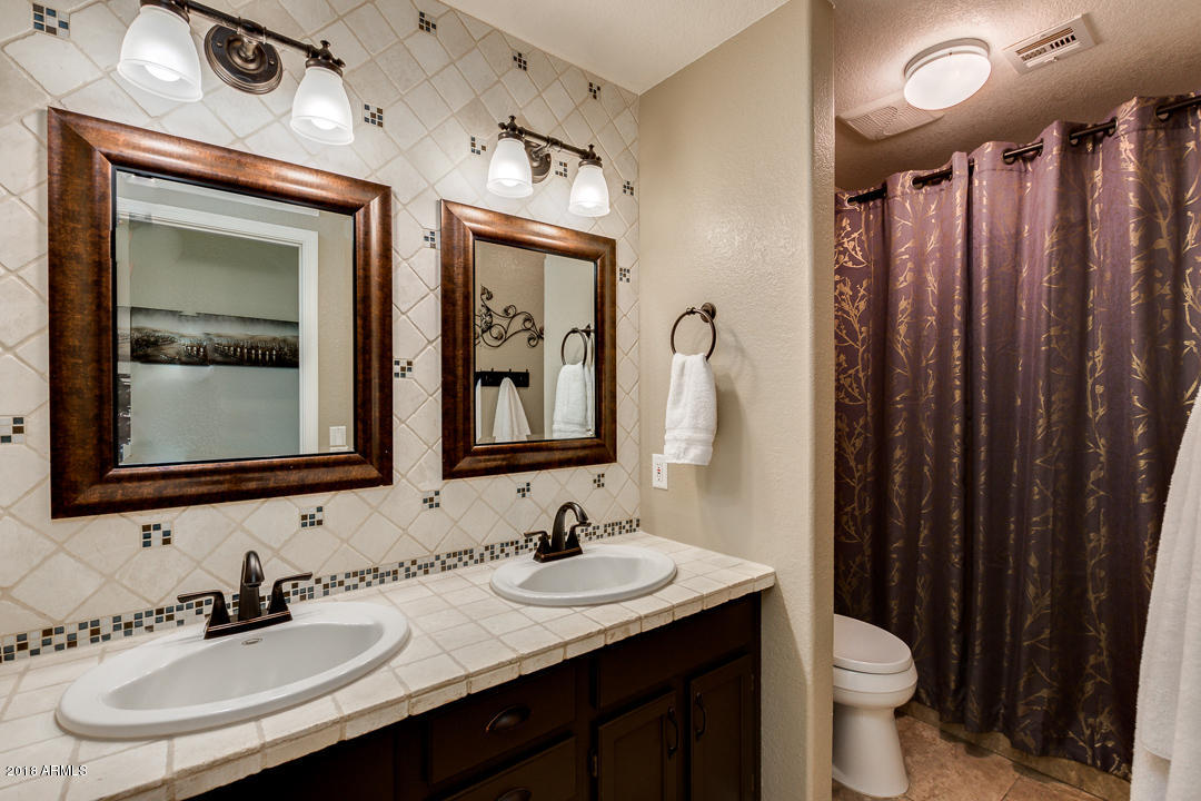 3351 West Drake Street Chandler, AZ 85226 - Photo 11 of 20 a bathroom with a double vanity sink and a mirror