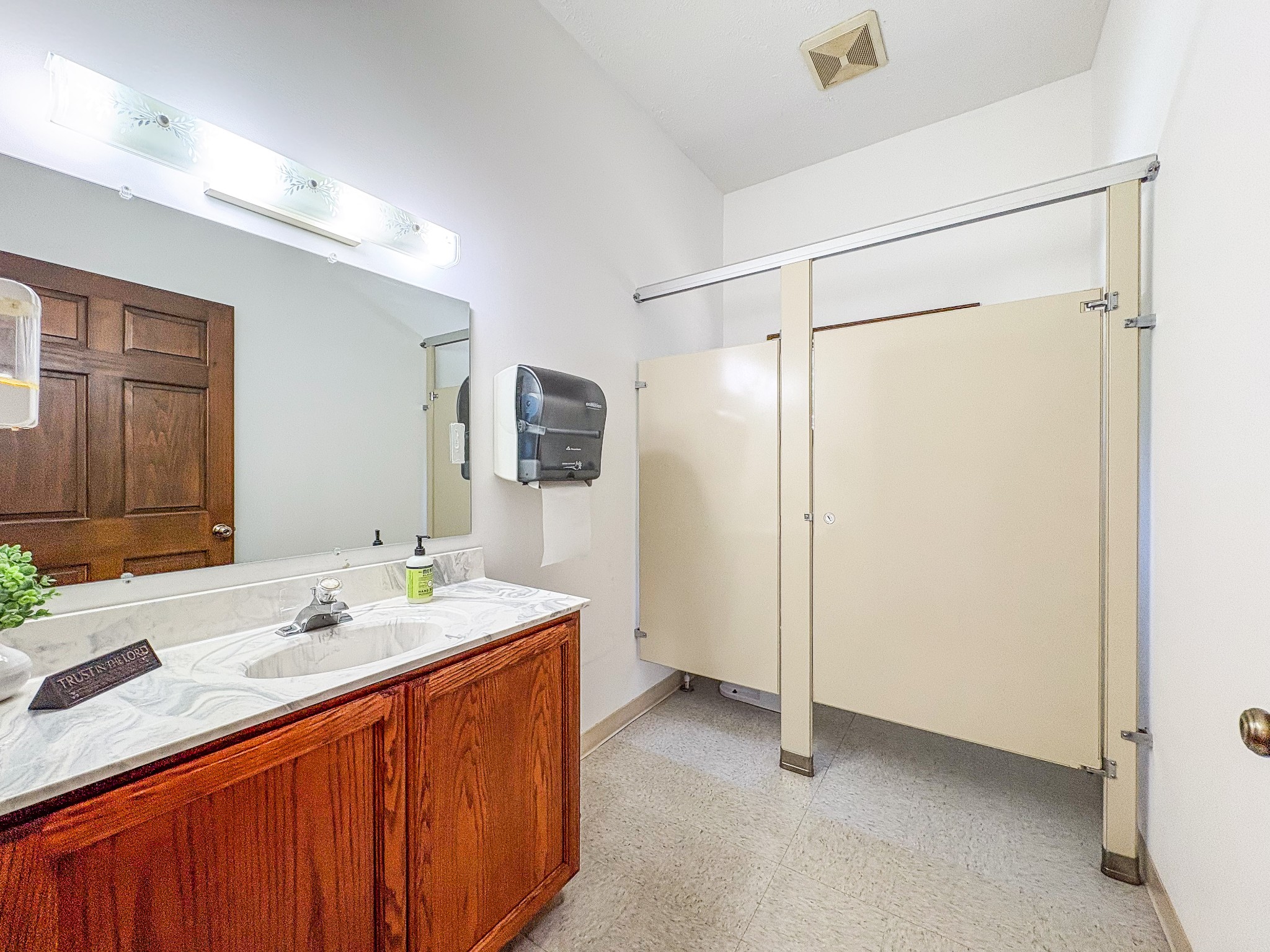 110 Hankins Road Hohenwald, TN 38462 - Photo 13 of 25 a bathroom with a sink double vanity and a mirror