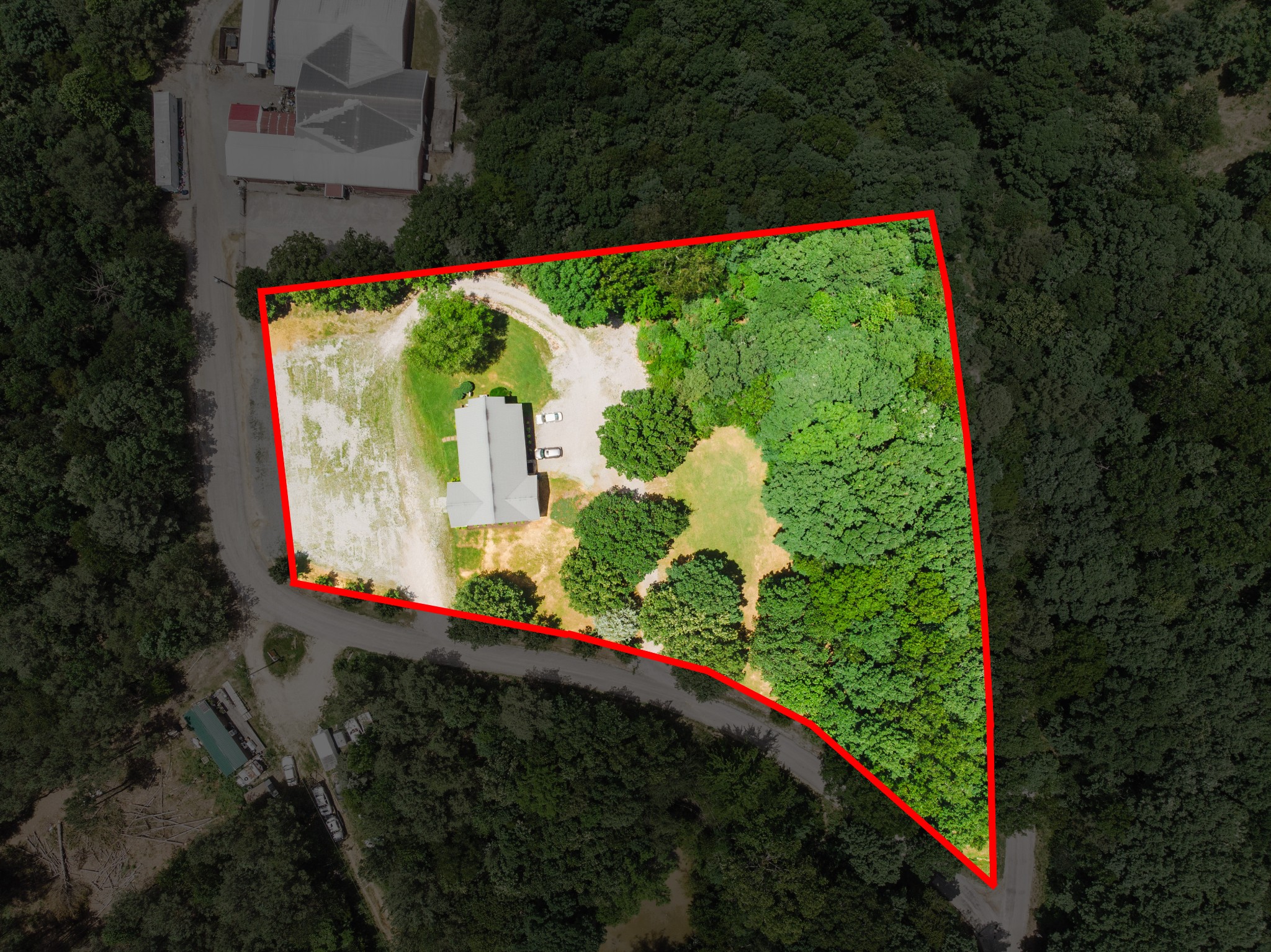 110 Hankins Road Hohenwald, TN 38462 - Photo 2 of 25 a view of a small yard