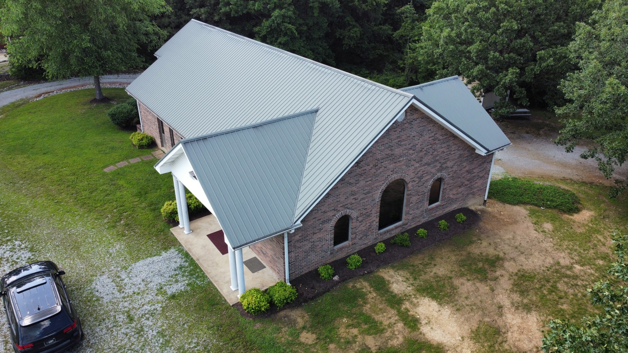 110 Hankins Road Hohenwald, TN 38462 - Photo 3 of 25 a aerial view of a house with a yard